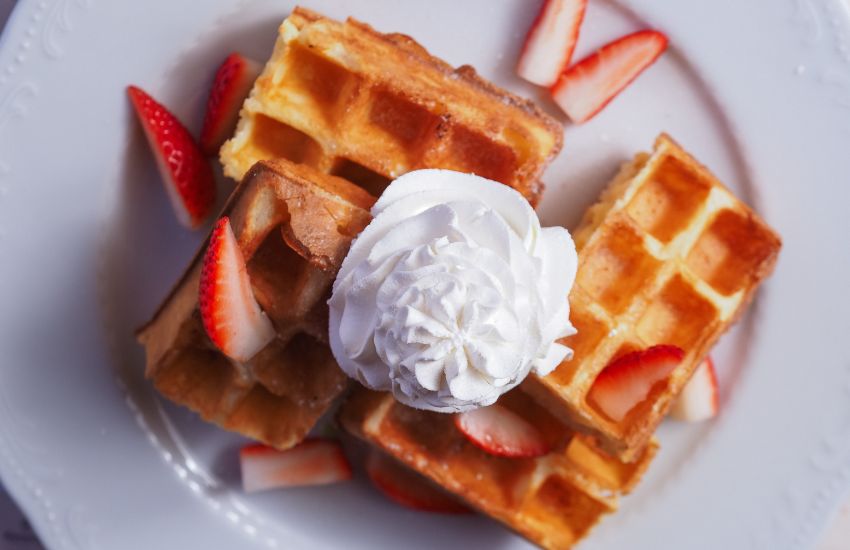 Waffles with whipped cream and strawberries from Downtown Walking Breakfast Tour Sarasota 